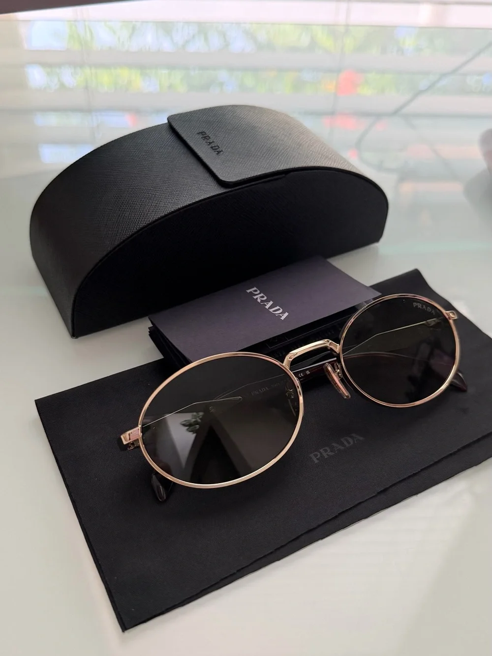Prada Gold Frame Sunglasses with Green Lenses